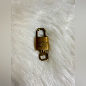#345 Authentic Louis Vuitton Gold Padlock and Key